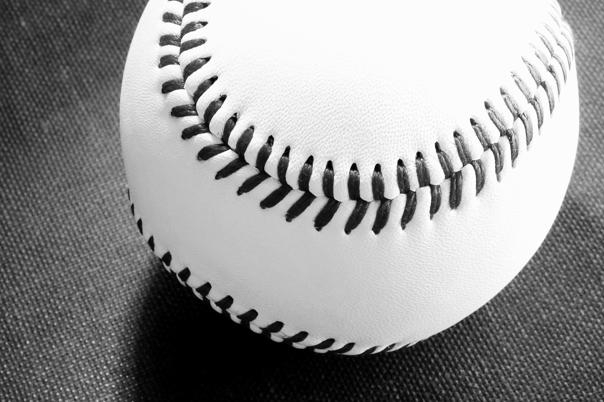 A black and white photo of a baseball
