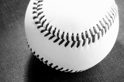 A black and white photo of a baseball